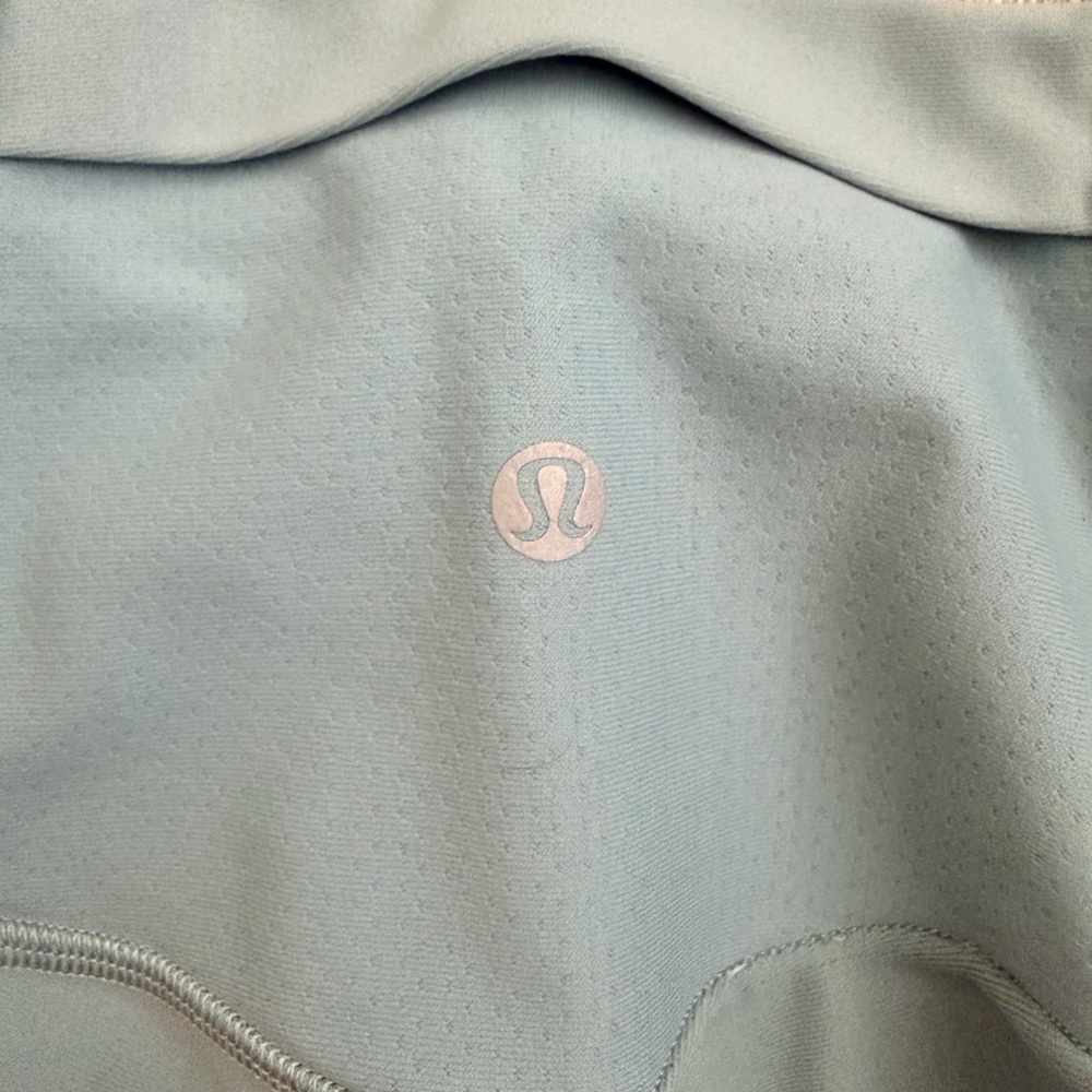 Flawed Lululemon Light Aqua Active Top with Reflective Logo